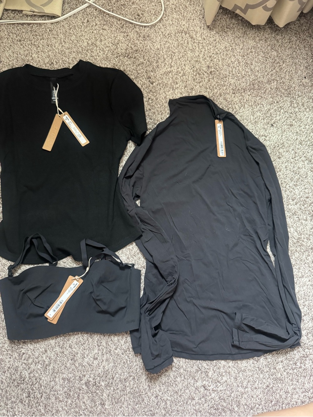 3-Piece SKIMS Black Activewear Set - Rib Tee, Long Sleeve Top & Bralette